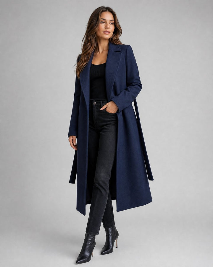 Navy wool-blend trench coat styled with black jeans and a fitted black top