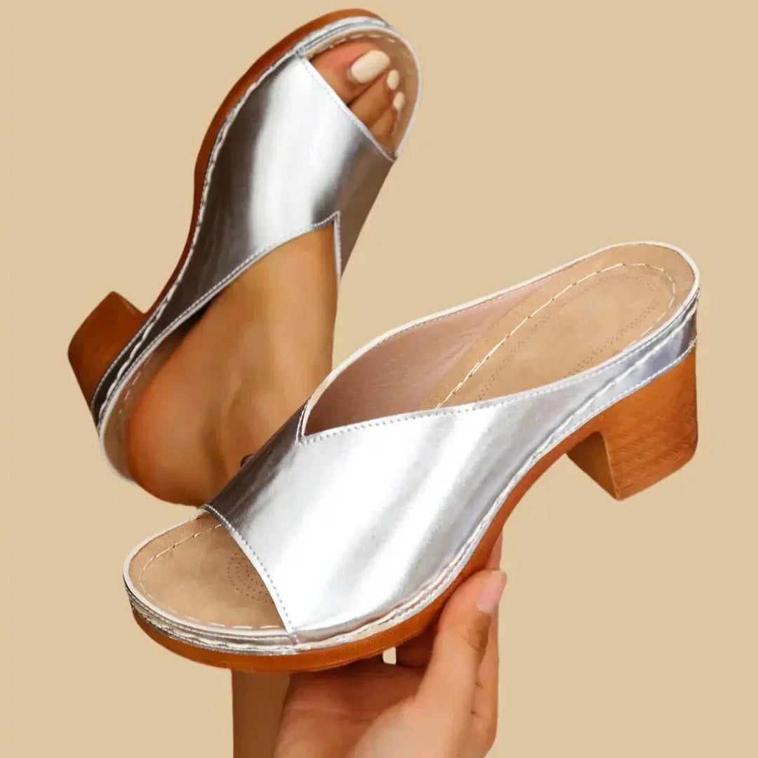 Silver peep-toe block heel mule with contrast stitching and wooden-effect sole