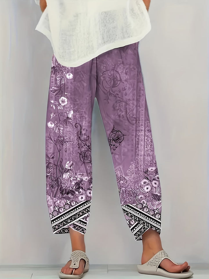 Dusty mauve floral print harem trousers featuring bohemian tribal cuff trim