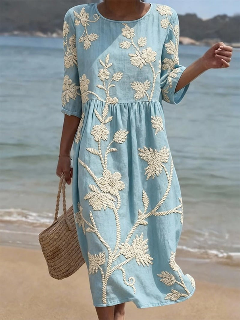 Duck-egg blue midi dress with cream floral embroidery and round neckline