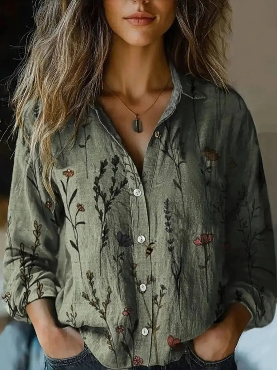 Sage green wildflower print blouse with button-up front and long sleeves