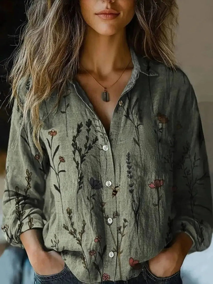 Sage green wildflower print blouse with button-up front and long sleeves