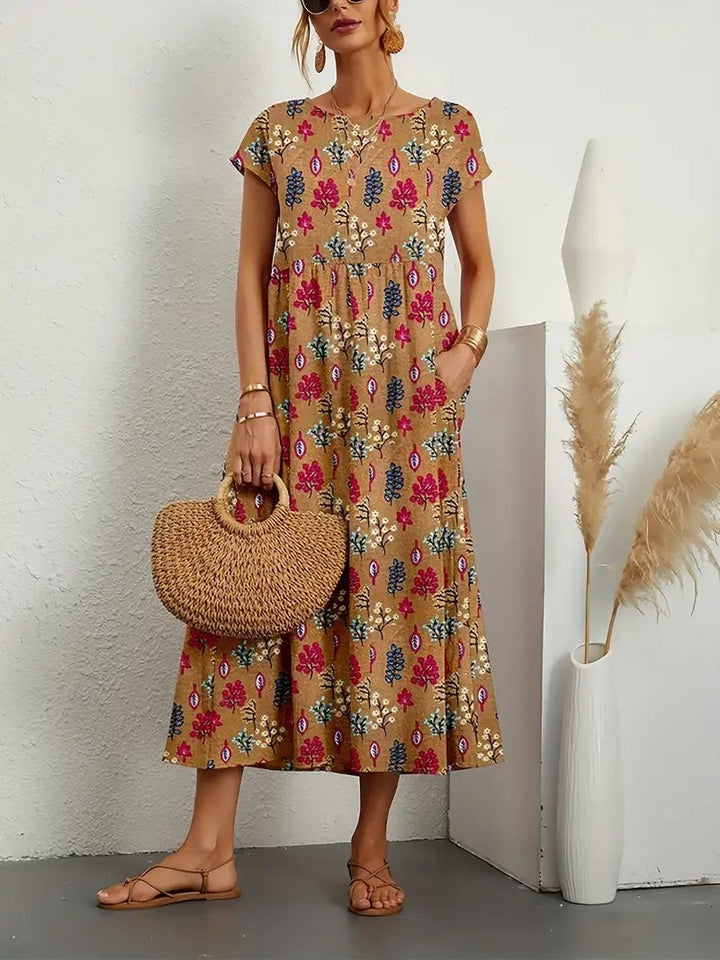 Tan floral print midi dress with short sleeves and flat sandals