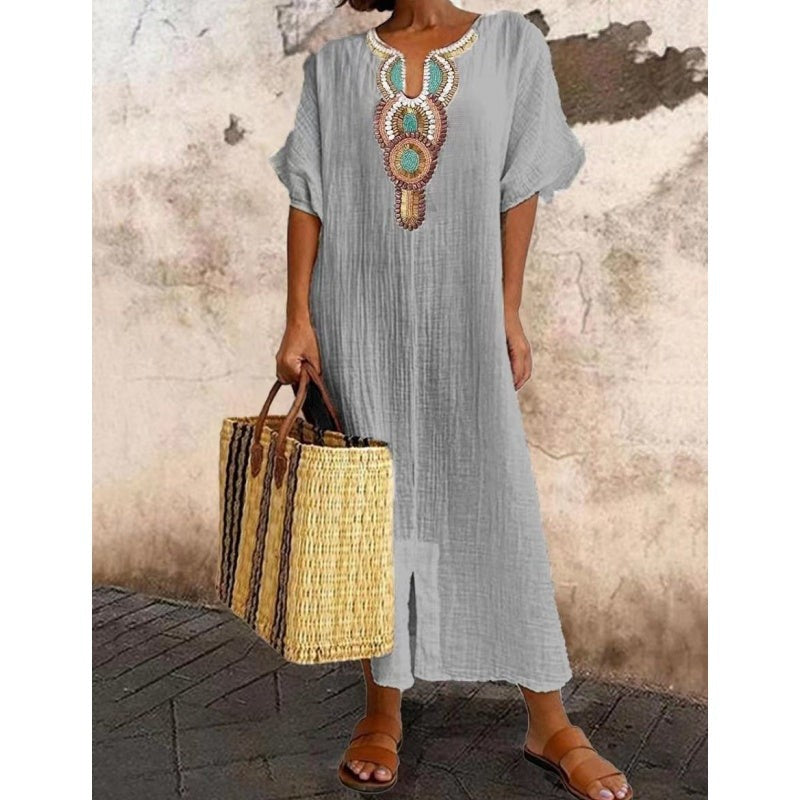 Grey linen-look maxi dress featuring embroidered tribal neckline detail