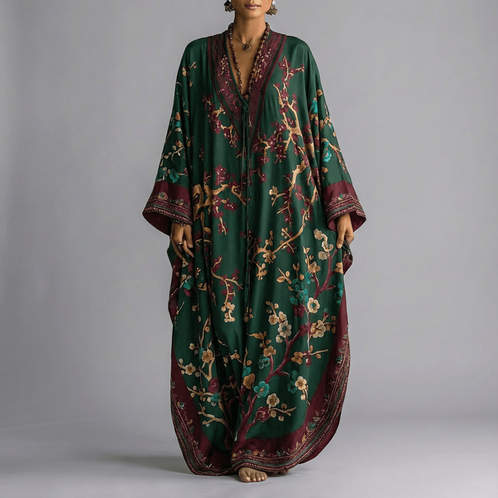 Green kaftan dress with cherry blossom print and maroon trim batwing sleeves