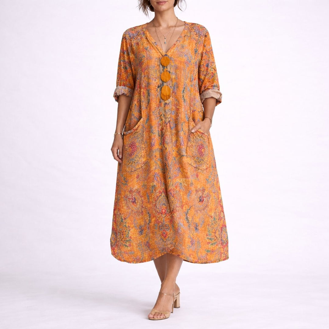 Orange bohemian print flowy maxi dress with three-quarter sleeves
