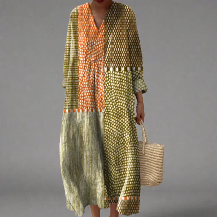 Colour-block maxi dress featuring polka dot and stripe patchwork design