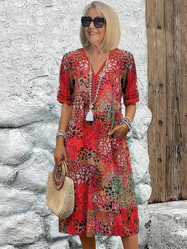 V-neck midi dress in red floral patchwork print with half-length sleeves