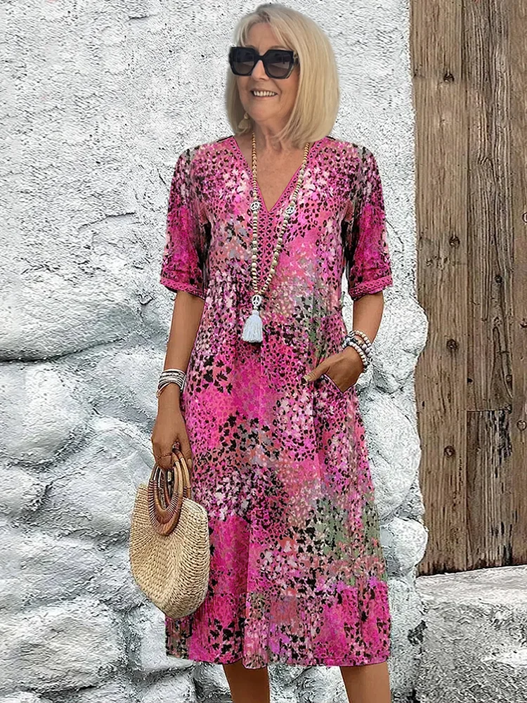 Pink floral patchwork midi dress featuring V-neckline and short sleeves