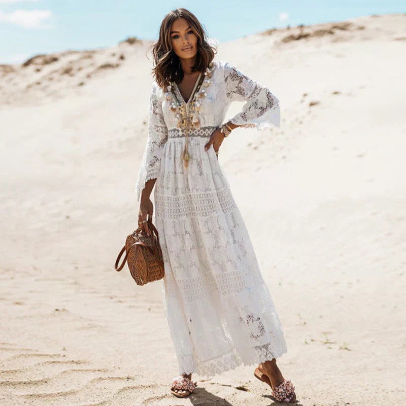 Crochet-trim lace maxi dress with bell sleeves, worn with beaded sandals on the beach