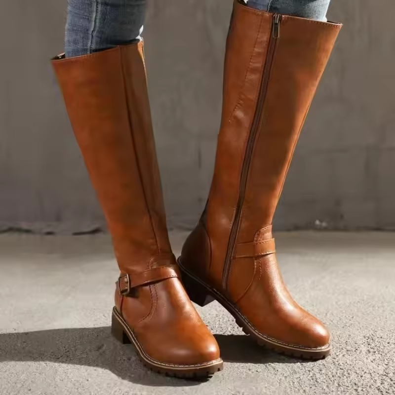 Cognac leather knee-high boots with side zip and buckle accent