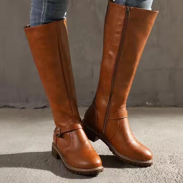 Cognac leather knee-high boots with side zip and buckle accent
