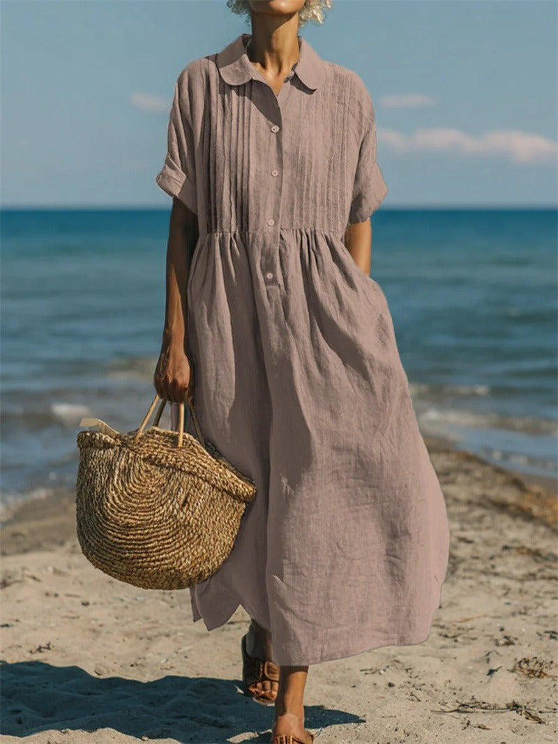 Mauve collared button dress with pin-tucked front and flowing midi skirt