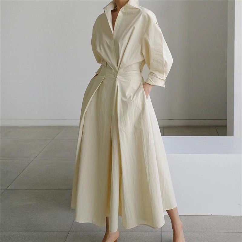 Pale yellow collared maxi dress with cinched waist and A-line skirt