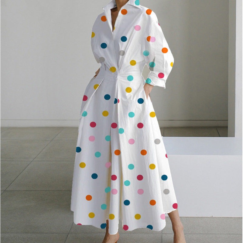 White maxi dress with colourful polka dots and long balloon sleeves