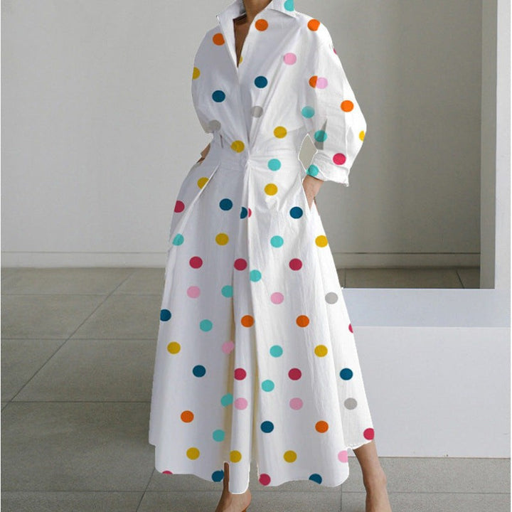 White maxi dress with colourful polka dots and long balloon sleeves