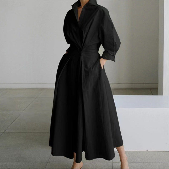 Black collared maxi dress with cinched waist and flared skirt