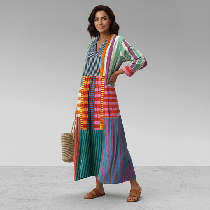 Multicolour geometric caftan maxi dress worn with tan slide sandals and straw bag