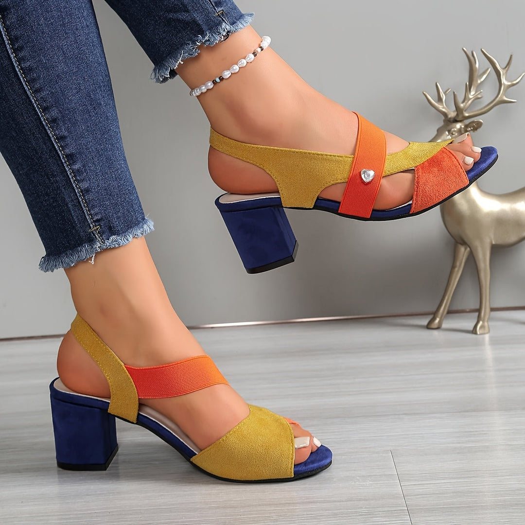 Colour-block peep-toe sandal with orange elastic strap and navy block heel