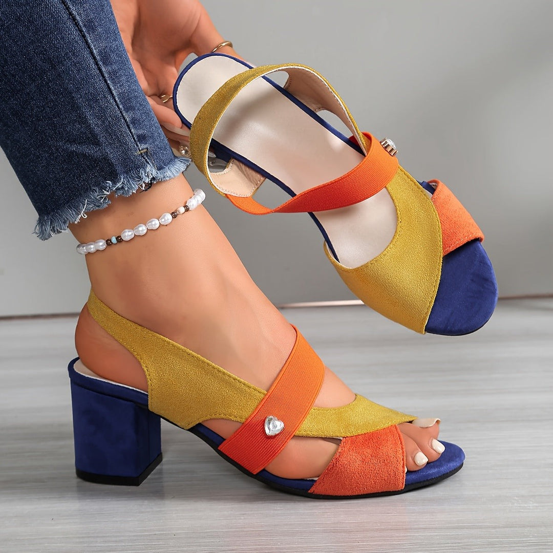 Yellow, orange and navy sandal showing block heel and crossover ankle strap