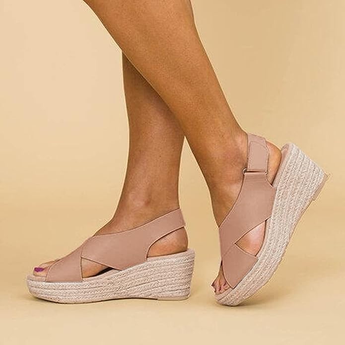 Nude espadrille wedge sandals with crisscross front straps, side view