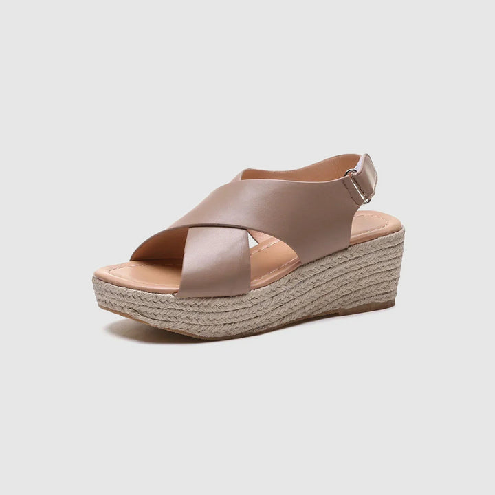 Blush pink leather crossover wedge sandal with braided espadrille sole