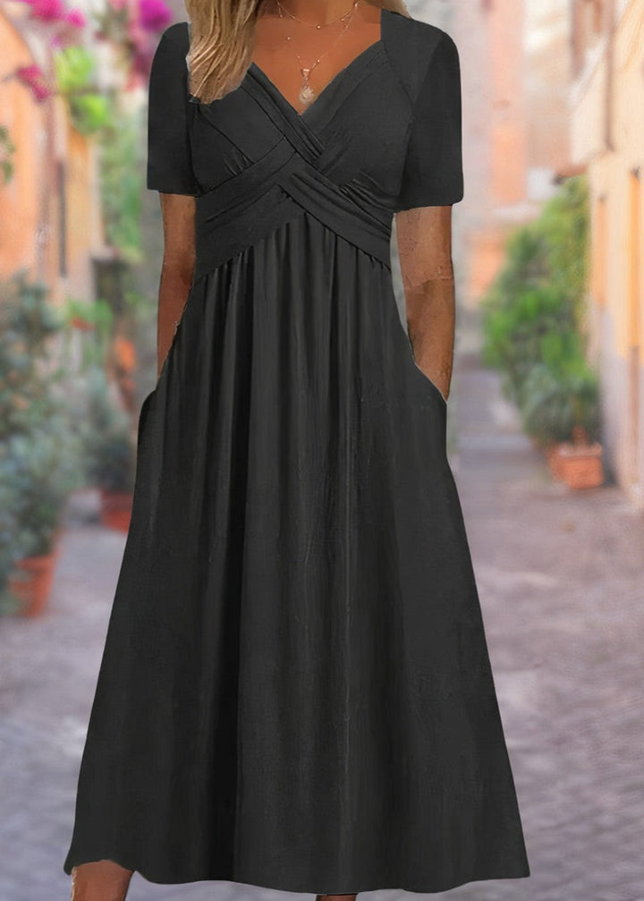 Black midi dress with criss-cross V-neck bodice and short sleeves