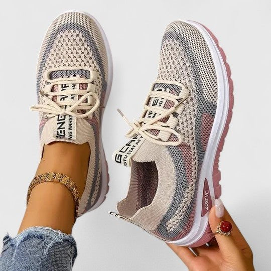 Pink and beige mesh lace-up trainers with breathable knit upper and chunky sole