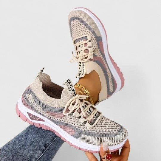Beige mesh trainers with dusty pink accents and cushioned platform sole
