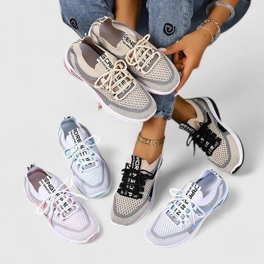 Four pairs of mesh lace-up trainers shown together in assorted colourways