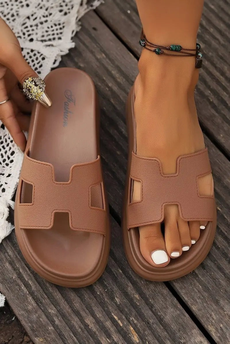 Tan H-strap platform sandals shown flat lay and worn side by side