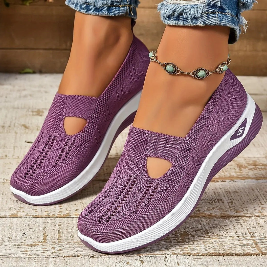 Mauve knitted slip-on trainers with cut-out detail and chunky white sole