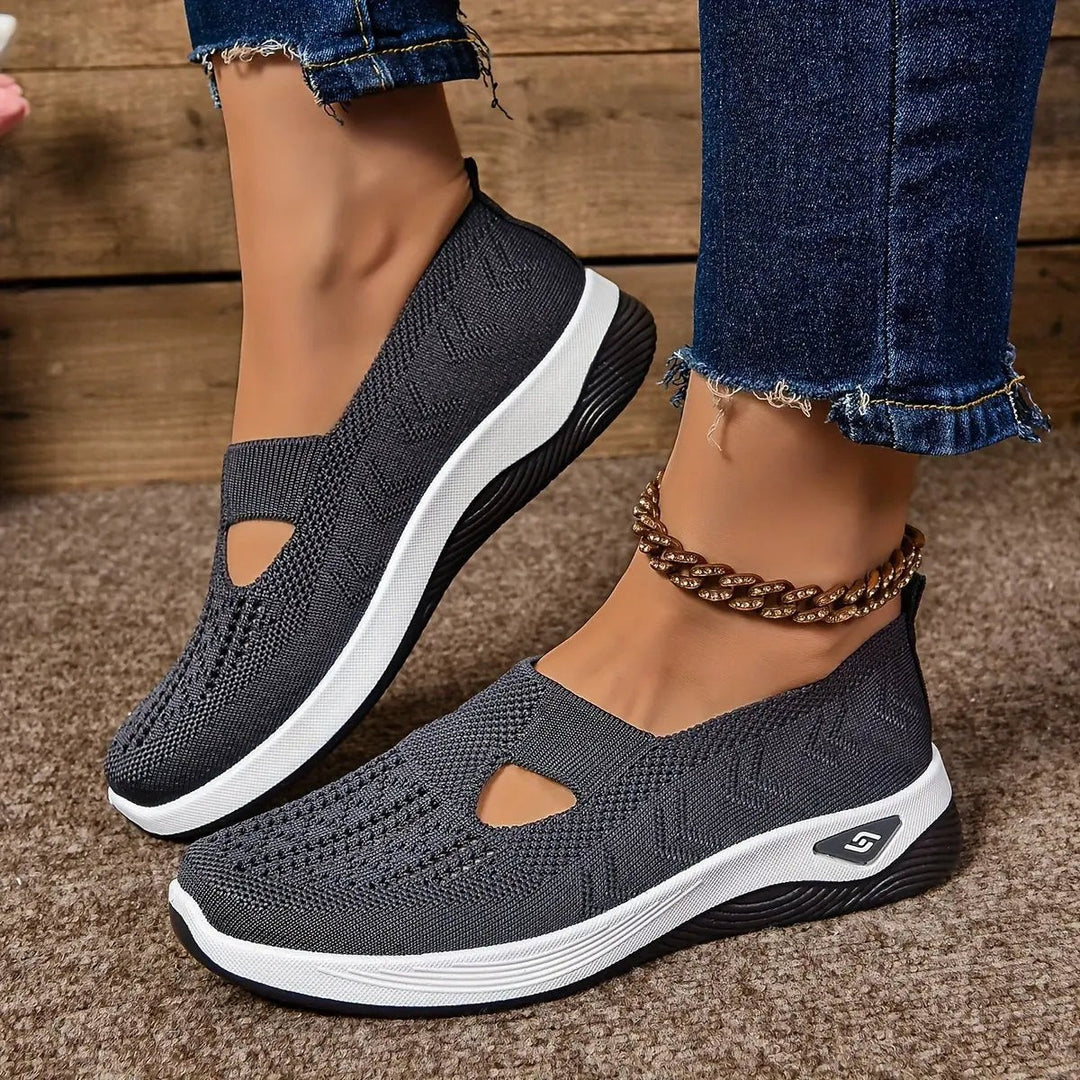 Charcoal grey mesh slip-on trainers with cut-out design and white sole