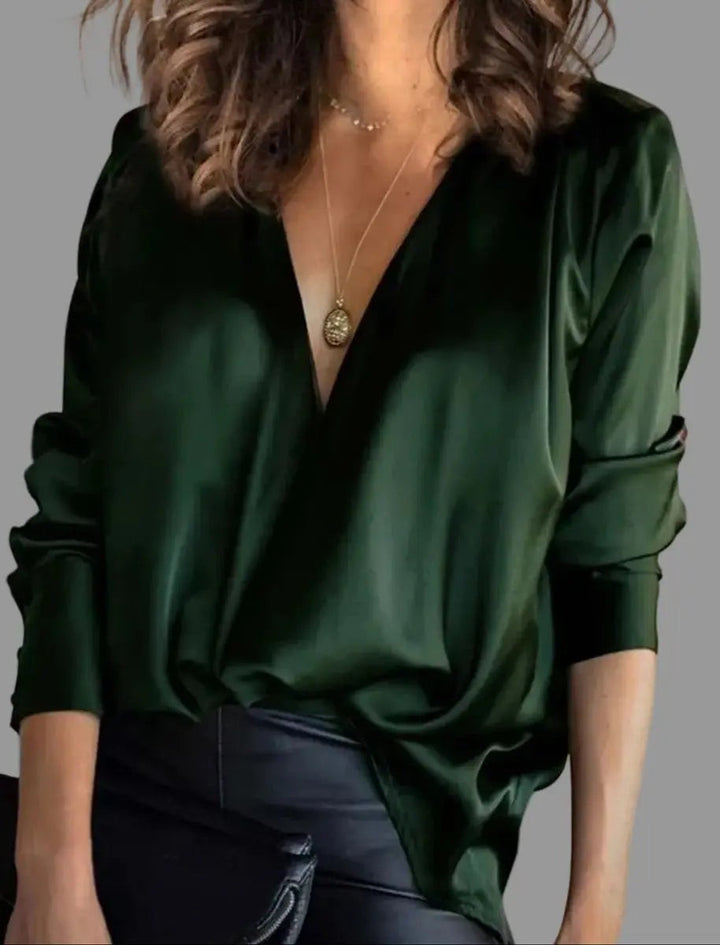 Emerald green satin blouse with draped deep V-neck and long sleeves