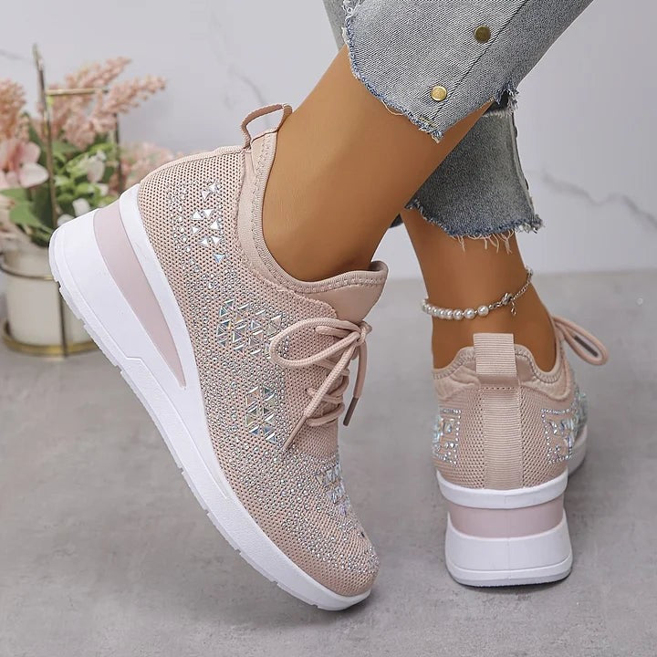 Blush pink knitted wedge trainers with diamante triangle patterning, rear view