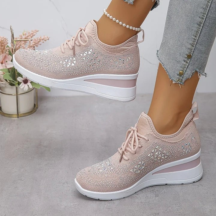 Blush pink knitted trainers with sparkling embellishments and lace-up front