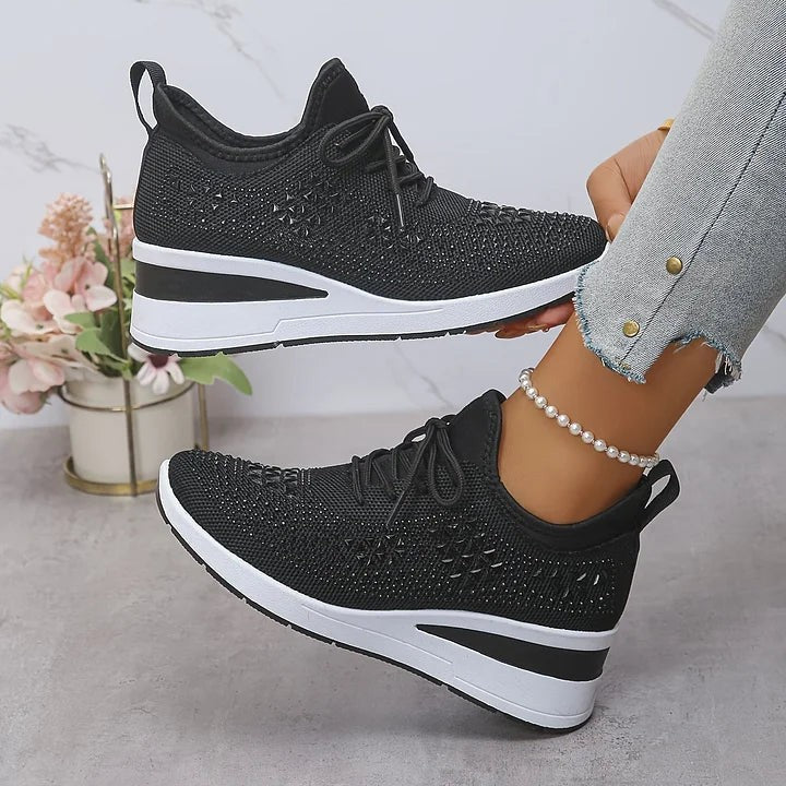Black knitted wedge trainers with sparkling star-patterned detailing
