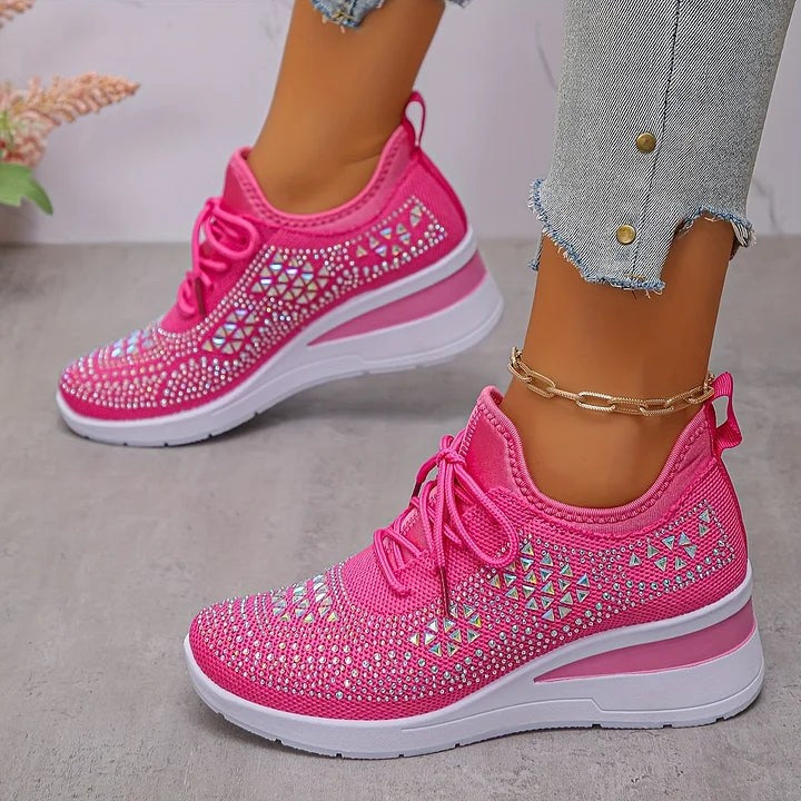 Hot pink knitted trainers featuring iridescent sparkling triangle embellishments