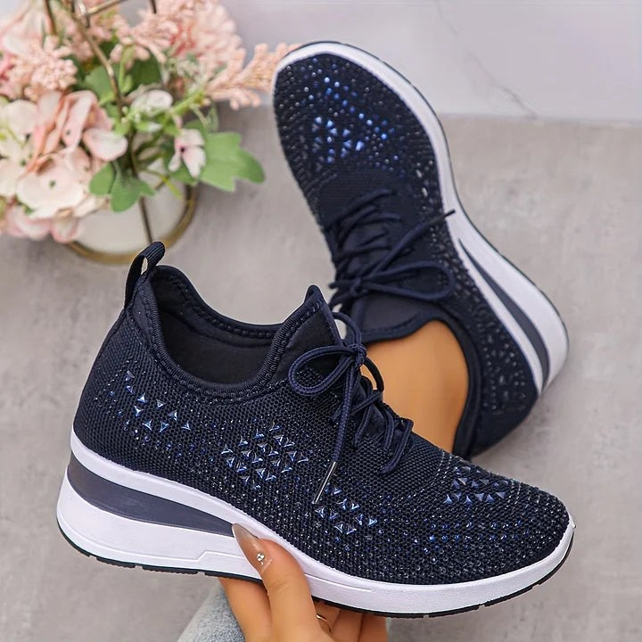 Navy knitted trainers featuring diamante triangle patterning and lace-up design