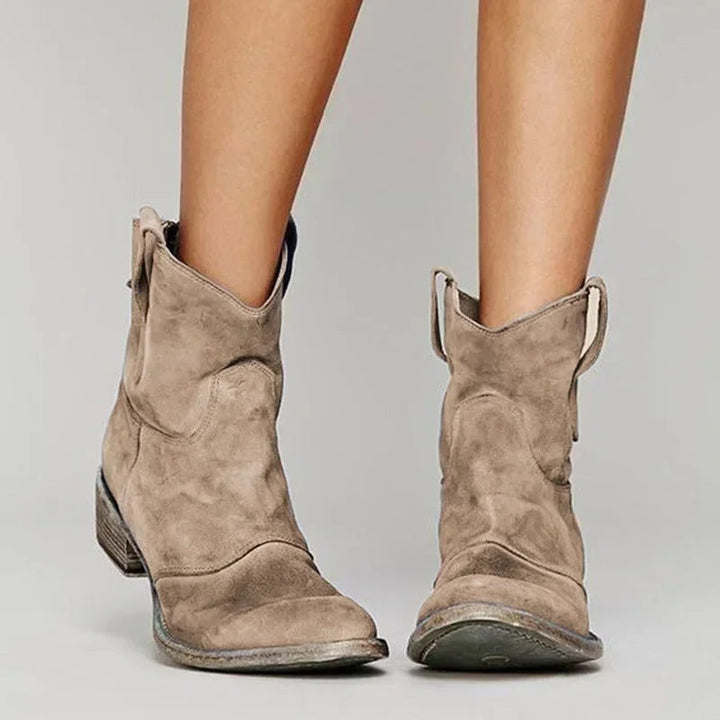 Taupe suede western ankle boots with distressed block heel