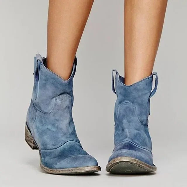 Blue suede western ankle boots with worn-look heel detail