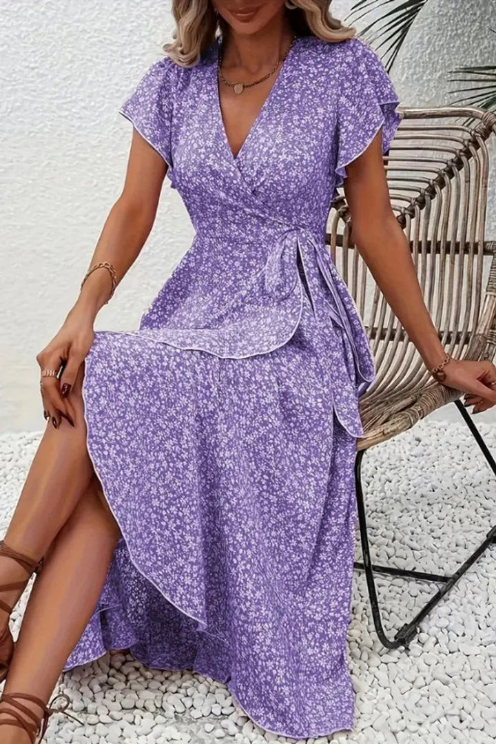 Purple floral wrap midi dress with ruffled sleeves and thigh-high split