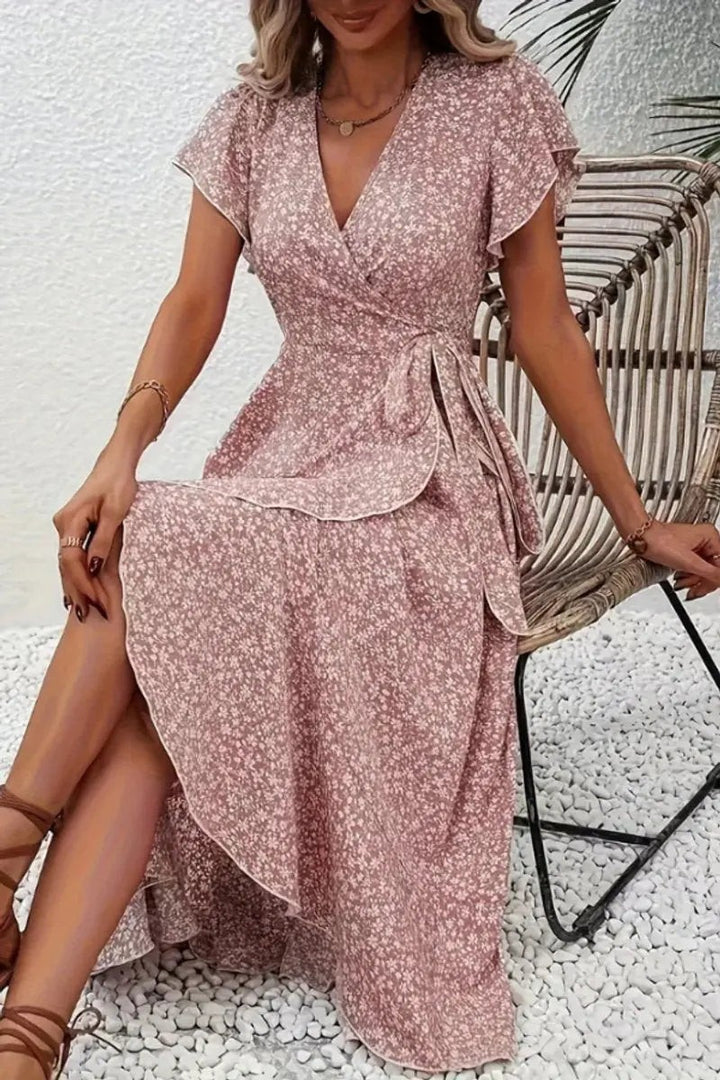 Dusty pink floral wrap dress with V-neck and ruffled cap sleeves