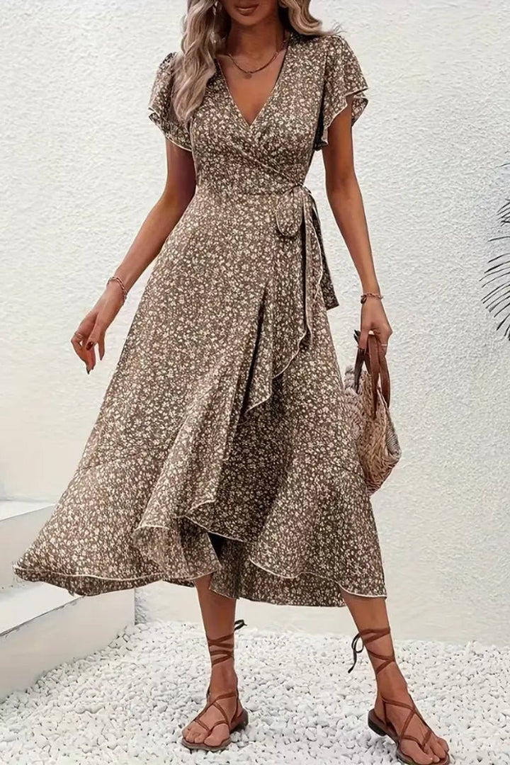 Brown ditsy floral wrap dress with flutter sleeves styled with tan sandals
