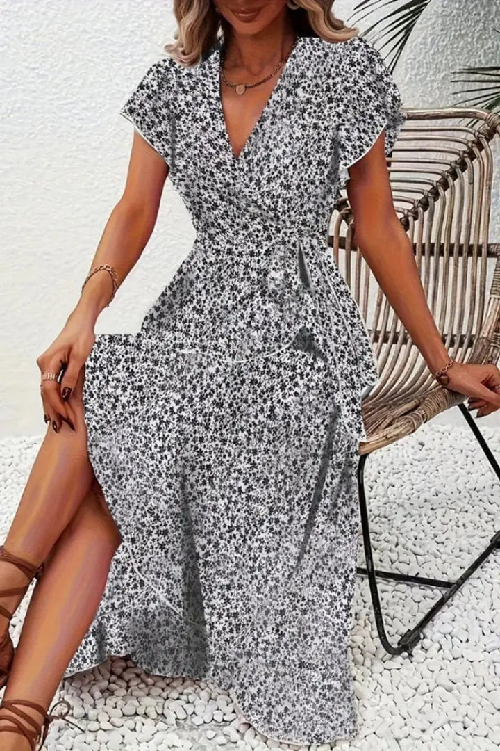 Monochrome floral wrap midi dress with V-neck and short flutter sleeves