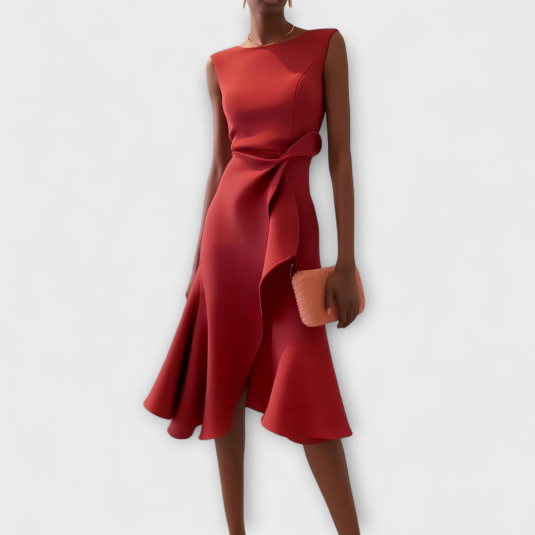 Rust red sleeveless midi dress with draped waist tie and asymmetric hem