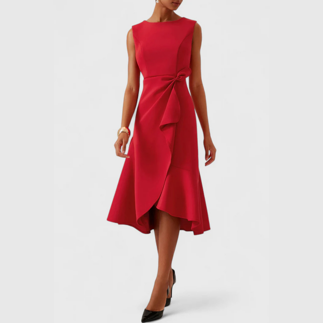 Red sleeveless midi dress with ruffled wrap-effect skirt, worn walking
