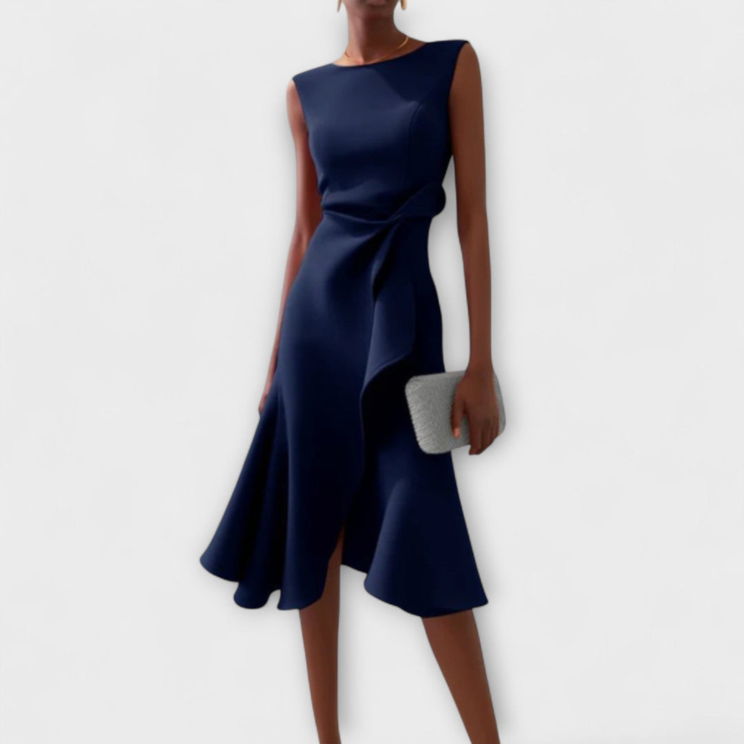 Navy sleeveless midi dress featuring draped waist detail and flared skirt