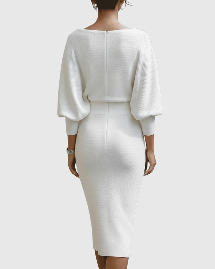 Back view of white batwing midi dress showing fitted waist and pencil skirt