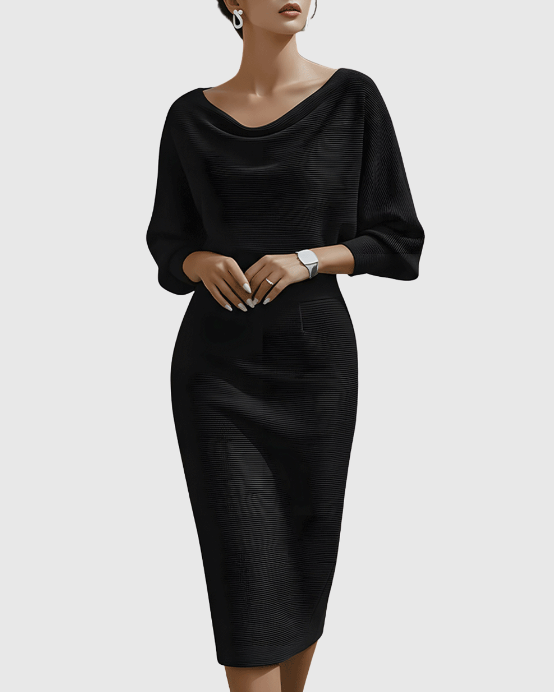 Close-up of black batwing midi dress with cowl neckline and ribbed texture